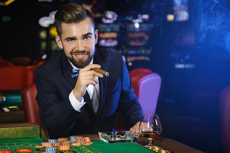 grandbet login app interface on mobile phone showing live blackjack table and betting controls